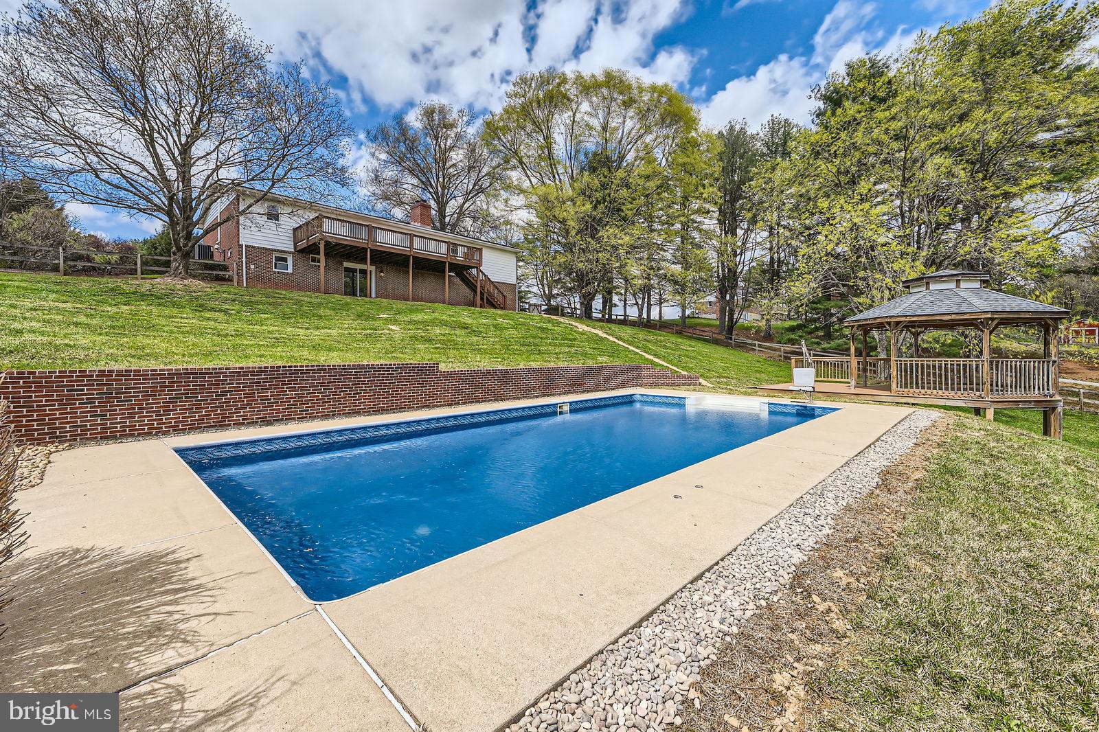 2701 Beckleysville Road Manchester, MD 21102 - Photo 36 of 39 a view of a swimming pool with a yard