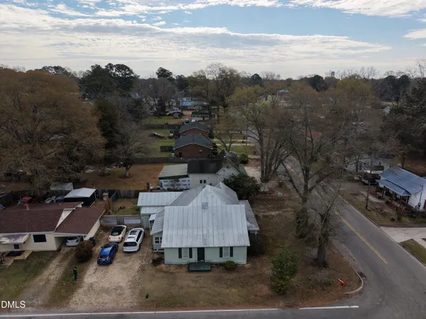 an aerial view of a house with mountain view