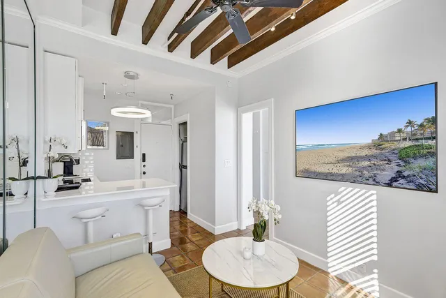 a bathroom with a toilet a sink and a mirror