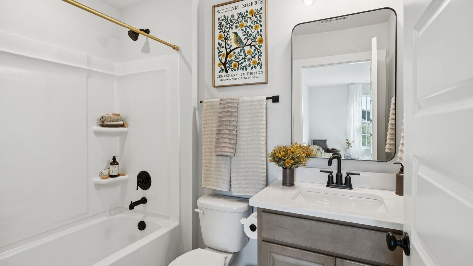 306 Harvest Point Boulevard Spring Hill, TN 37174 - Photo 48 of 70 a bathroom with a sink a toilet and shower