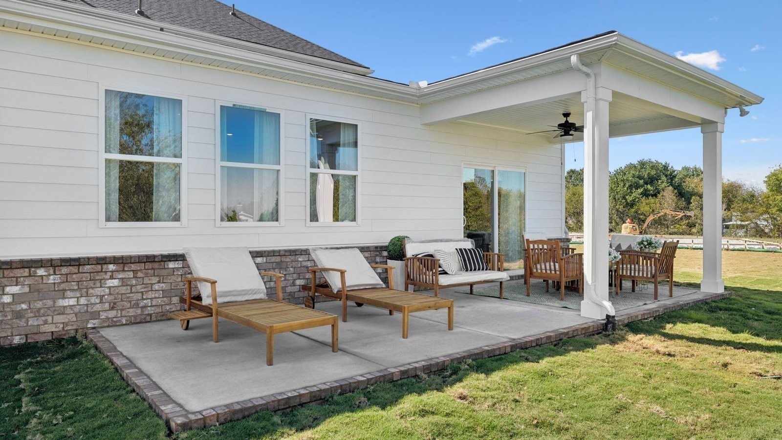 306 Harvest Point Boulevard Spring Hill, TN 37174 - Photo 52 of 70 a building outdoor space with patio furniture and potted plants