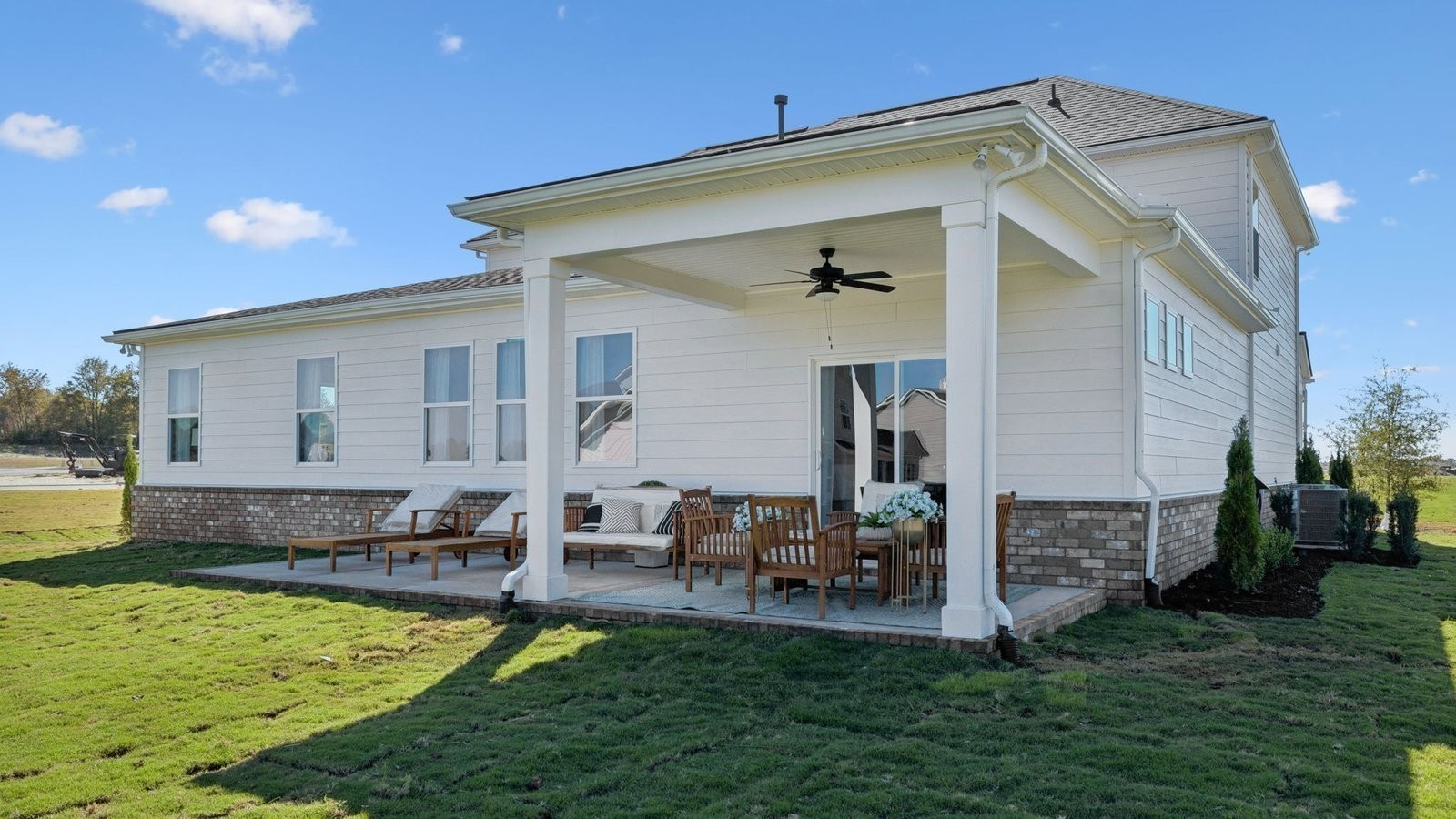 306 Harvest Point Boulevard Spring Hill, TN 37174 - Photo 55 of 70 a view of a house with backyard and sitting area