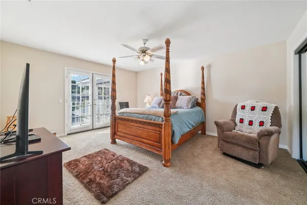 a bed room with a bed and a fireplace