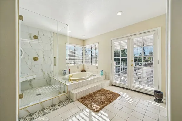 a view of balcony with furniture