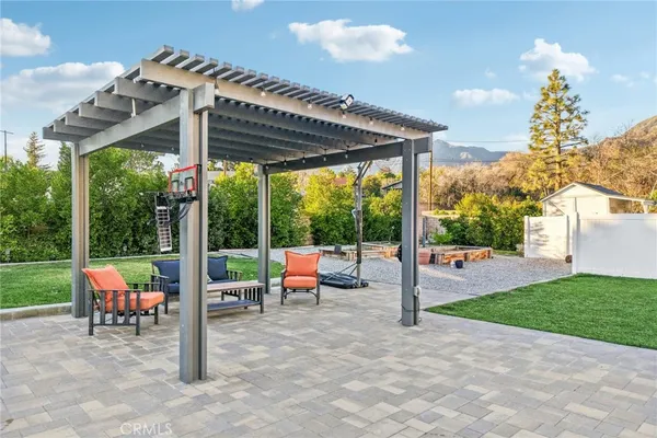 a view of a cafe with sitting area
