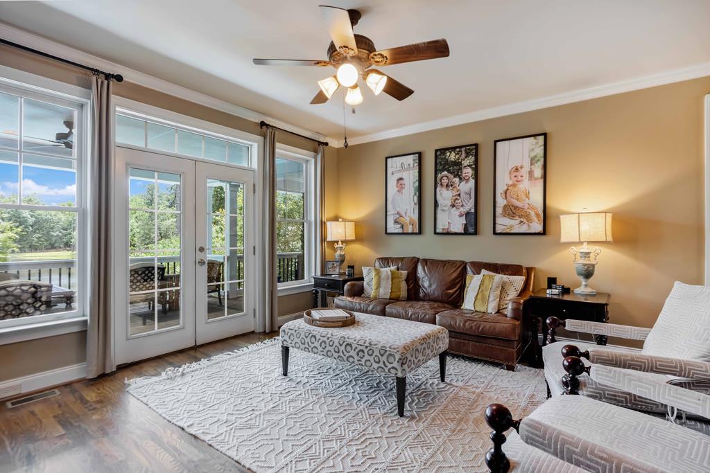 178 Rolling Farm Way Midland, GA 31820 - Photo 13 of 65 a living room with furniture and a large window