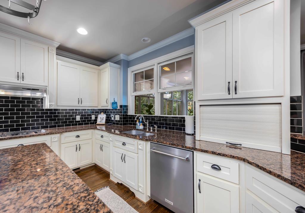 178 Rolling Farm Way Midland, GA 31820 - Photo 20 of 65 a kitchen with granite countertop a sink and cabinets