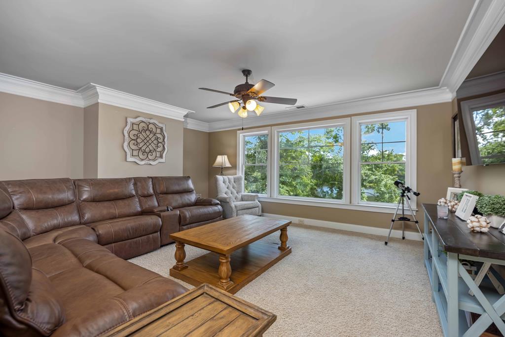 178 Rolling Farm Way Midland, GA 31820 - Photo 28 of 65 a living room with furniture and a large window