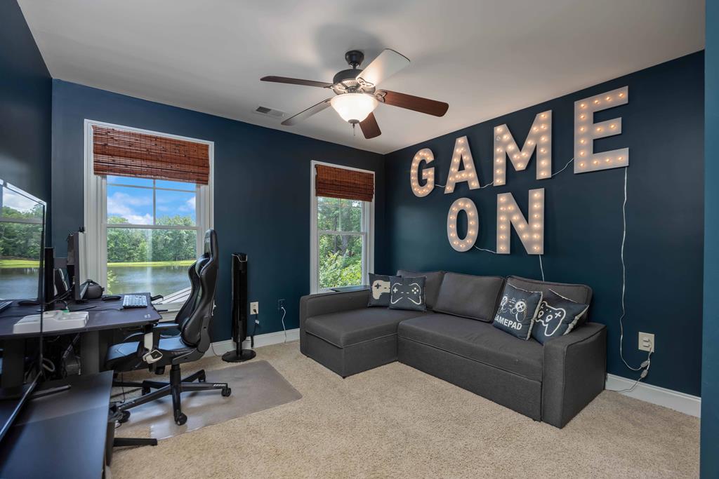 178 Rolling Farm Way Midland, GA 31820 - Photo 29 of 65 a living room with furniture and large windows