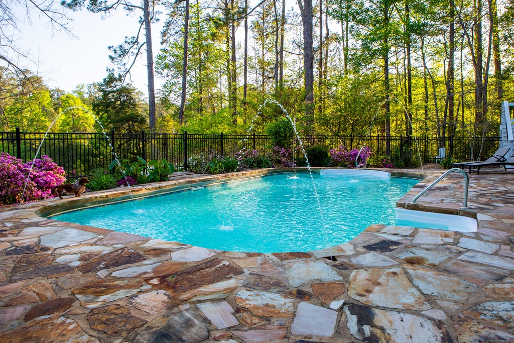 178 Rolling Farm Way Midland, GA 31820 - Photo 55 of 65 a view of a backyard with a garden