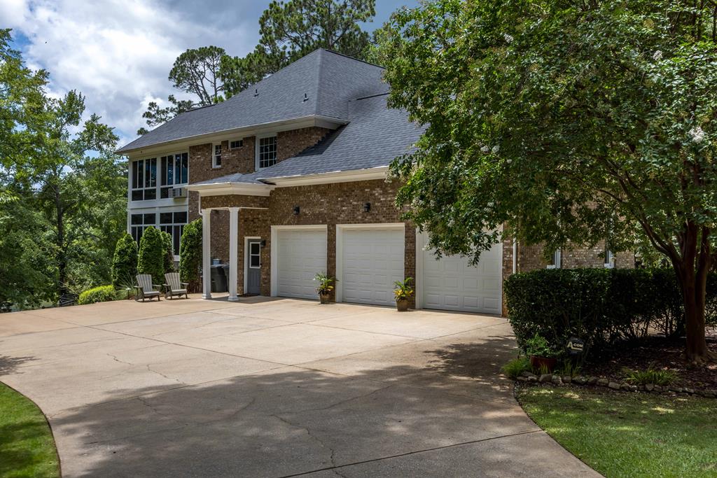 178 Rolling Farm Way Midland, GA 31820 - Photo 8 of 65 a front view of a house with a garden