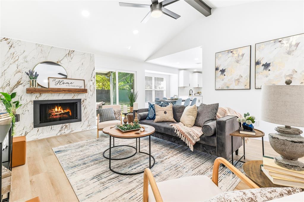 902 Warrington Court Arlington, TX 76014 - Photo 1 of 30 a living room with furniture and a fireplace