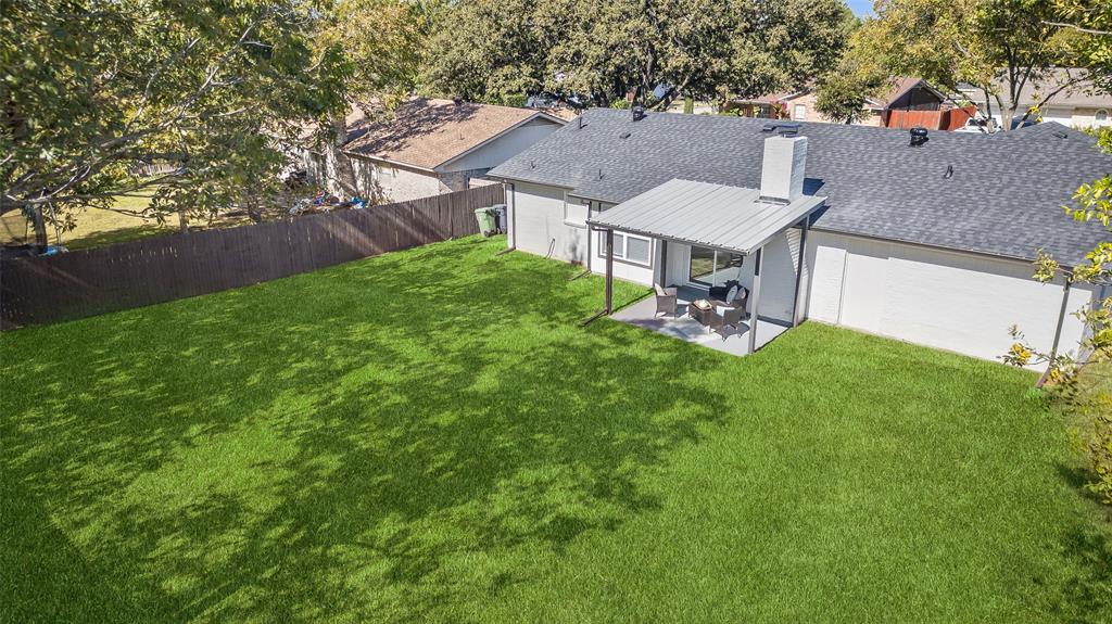 902 Warrington Court Arlington, TX 76014 - Photo 23 of 30 an aerial view of a house with a garden