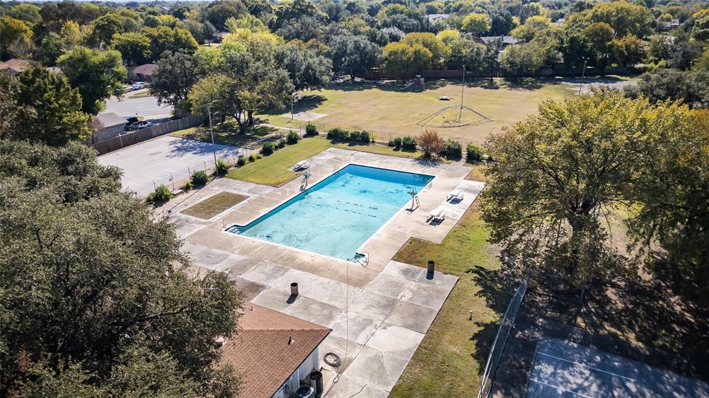 902 Warrington Court Arlington, TX 76014 - Photo 27 of 30 an aerial view of a house with a yard and lake view