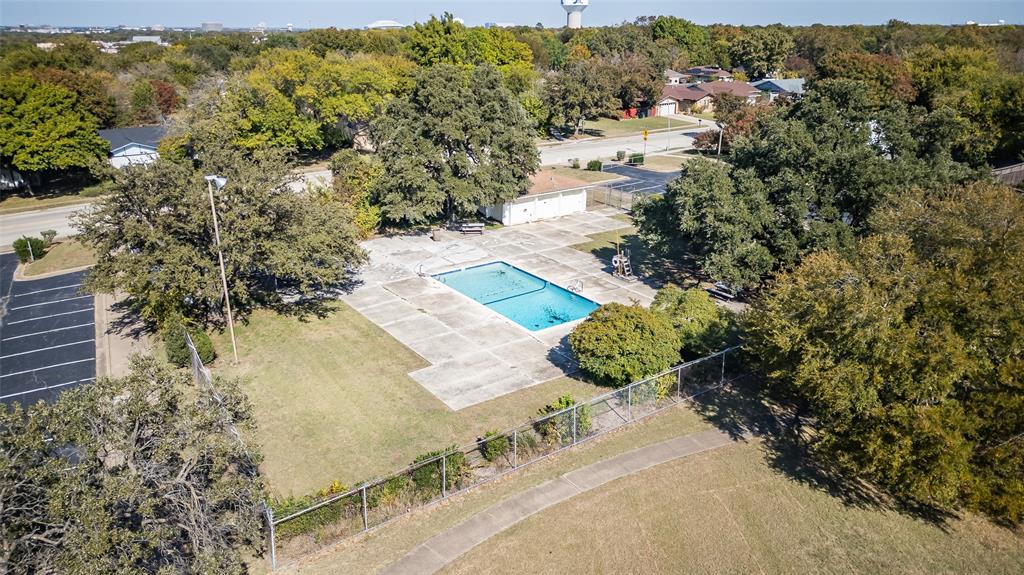 902 Warrington Court Arlington, TX 76014 - Photo 30 of 30 a view of a lake with beach