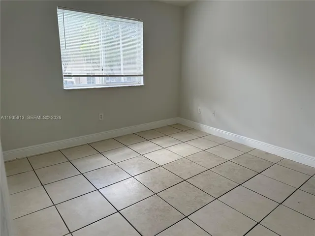 a view of a room and window