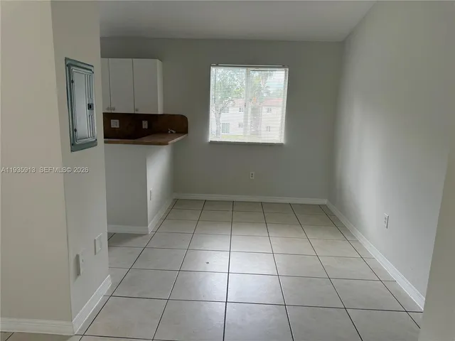 a view of a utility room and window