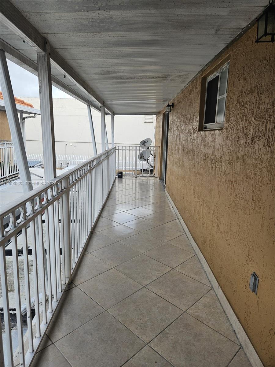2527 West 76th Street, Unit 208 Hialeah, FL 33016 - Photo 23 of 24 a view of a porch