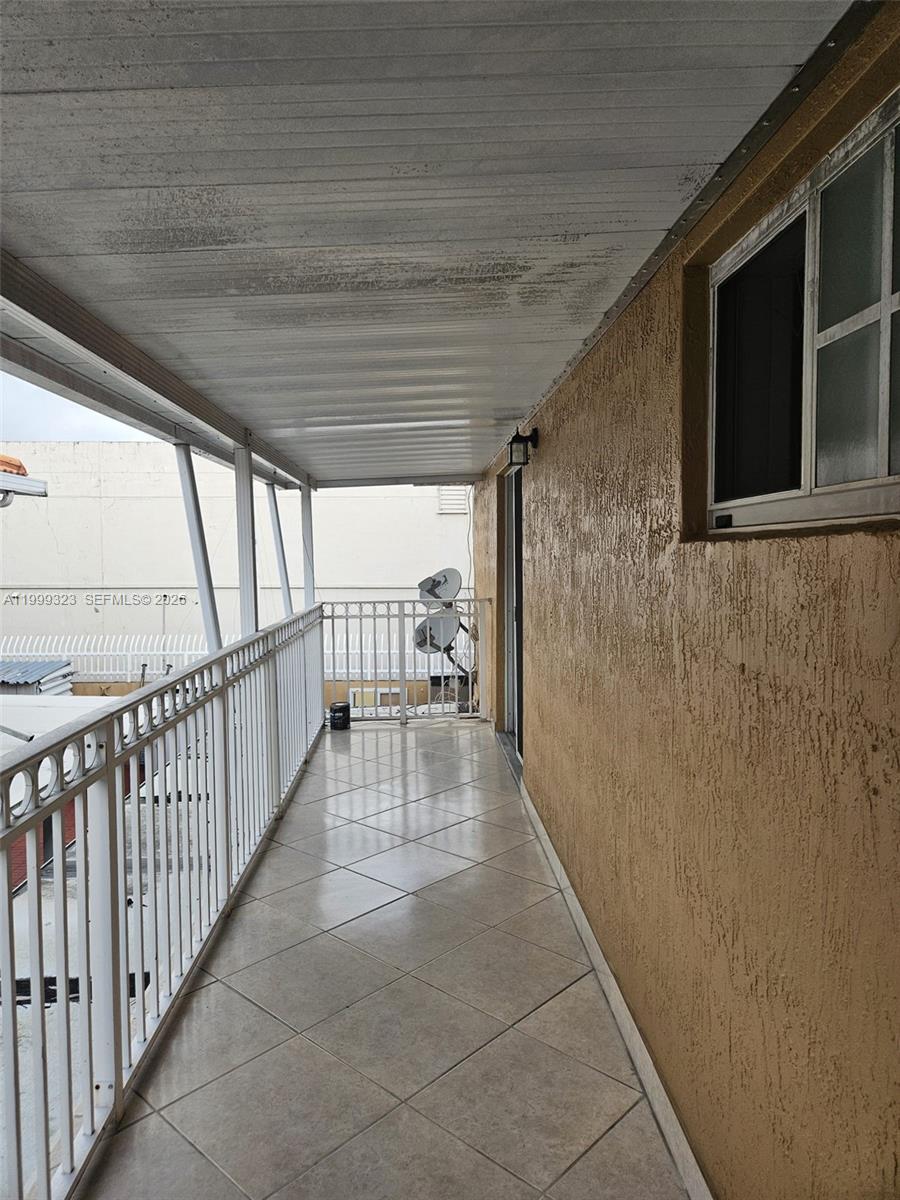 2527 West 76th Street, Unit 208 Hialeah, FL 33016 - Photo 24 of 24 a view of a balcony