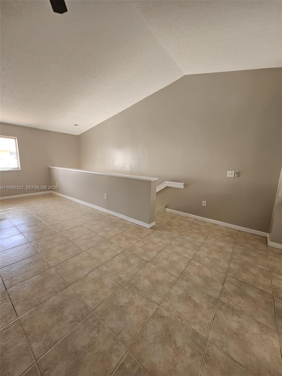 2527 West 76th Street, Unit 208 Hialeah, FL 33016 - Photo 3 of 24 a view of an empty room