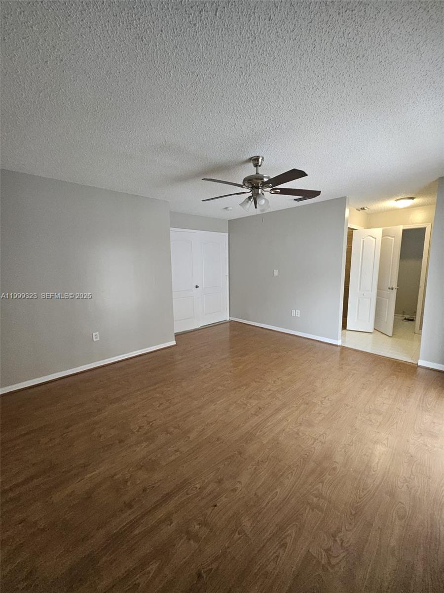 2527 West 76th Street, Unit 208 Hialeah, FL 33016 - Photo 10 of 24 a view of an empty room