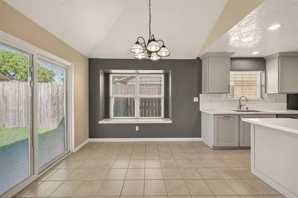 a view of a kitchen with a sink and dishwasher kitchen view