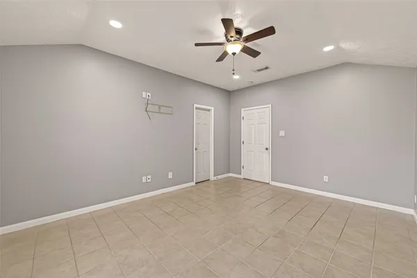 a bathroom with a bathtub and a sink
