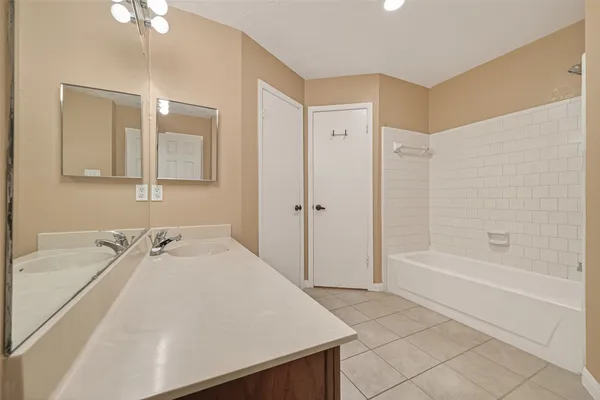 a bathroom with a sink a vanity and a mirror