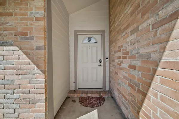 a bathroom with a granite countertop shower