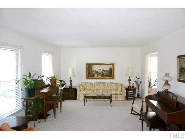 5026 Raintree Road Durham, NC 27712 - Photo 2 of 12 Large Foyer opens to big Living Room with lots of day light. A large cased opening at one end opens to the dining room. Living Room