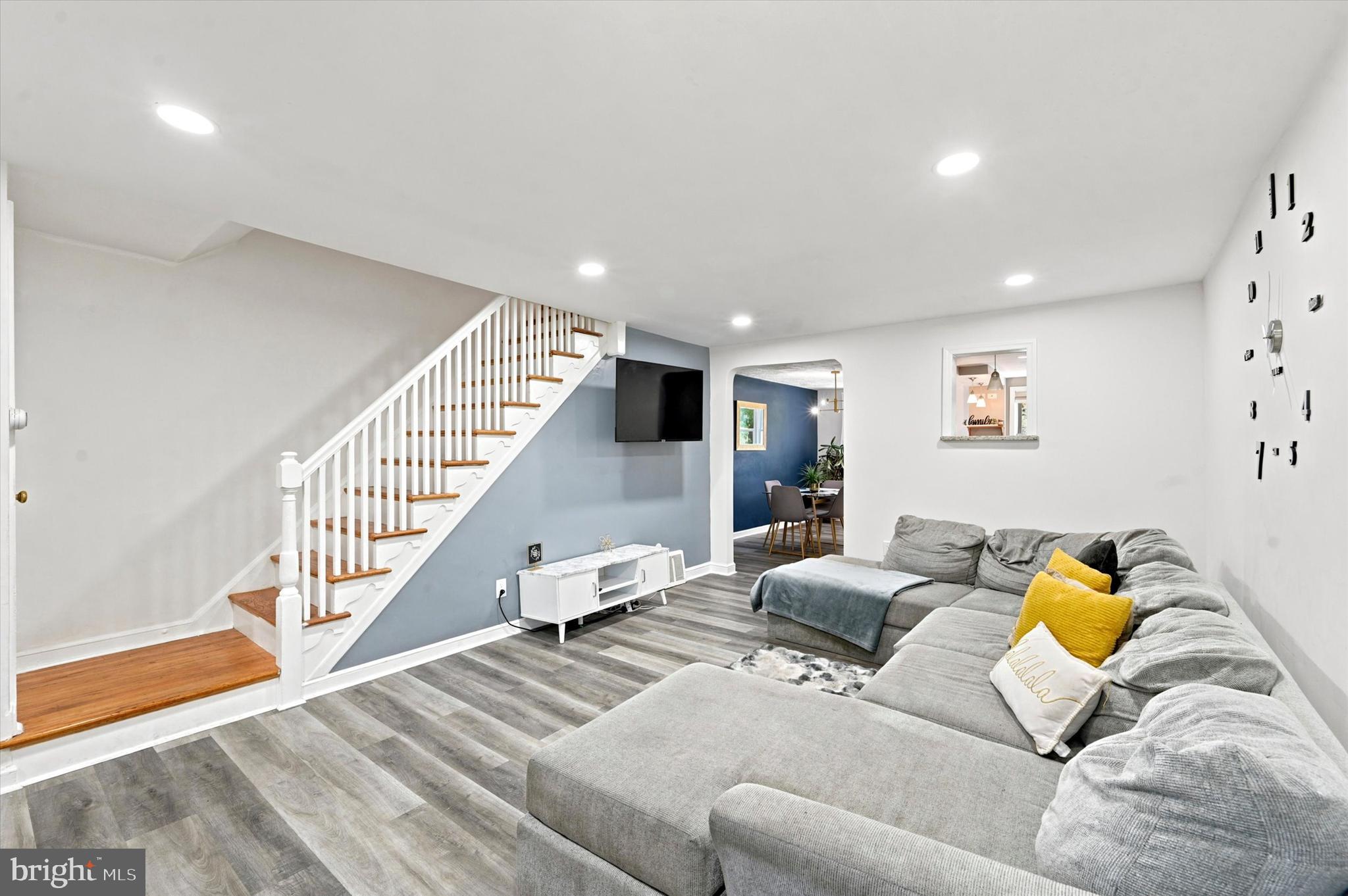 268 Blanchard Road Drexel Hill, PA 19026 - Photo 2 of 15 a living room with furniture and stairs