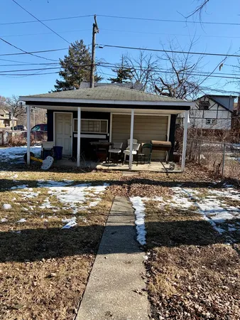 a view of a house with a patio