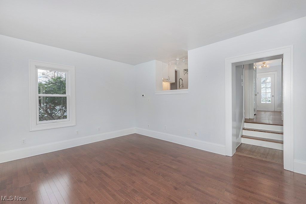 2596 Ashton Road Cleveland, OH 44118 - Photo 18 of 43 Unfurnished room featuring dark wood-type flooring