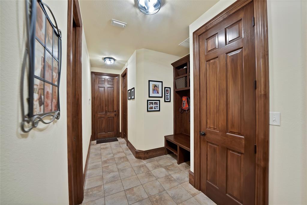 7421 Dawn Avenue Pilot Point, TX 76258 - Photo 28 of 40 a view of a hallway with closet and a bathroom