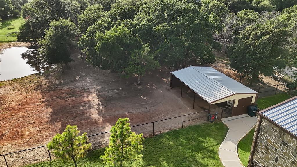 7421 Dawn Avenue Pilot Point, TX 76258 - Photo 34 of 40 a view of a yard with plants