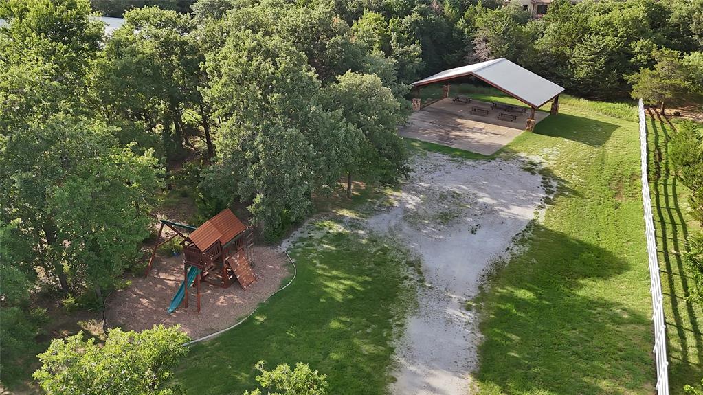 7421 Dawn Avenue Pilot Point, TX 76258 - Photo 38 of 40 an aerial view of a house with a yard
