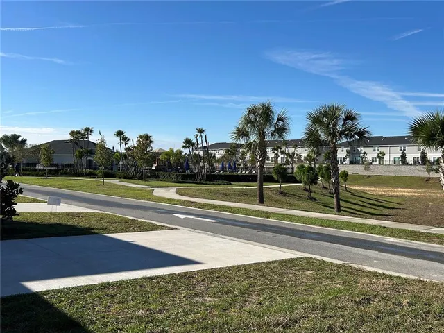a view of a swimming pool with an ocean view