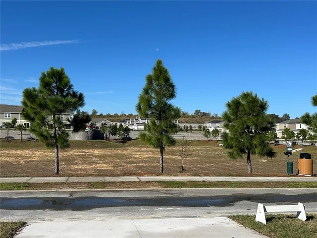 a view of a street in front of a building