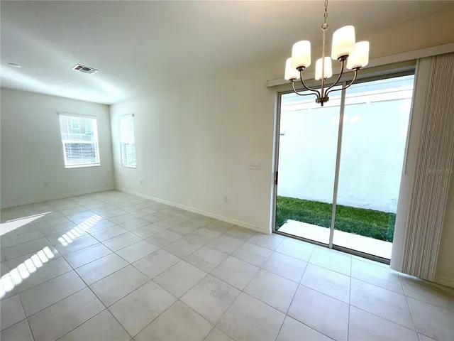 a view of a room with a chandelier