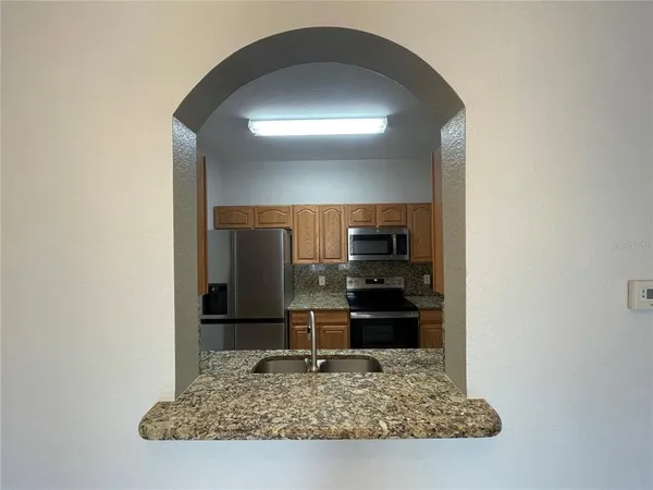 a room with a table and chairs