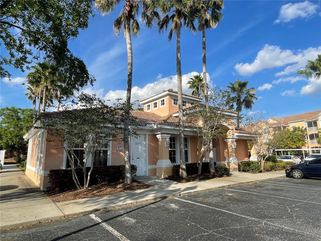 13548 Turtle Marsh Loop, Unit 427 Orlando, FL 32837 - Photo 33 of 34 a view of a building with a street