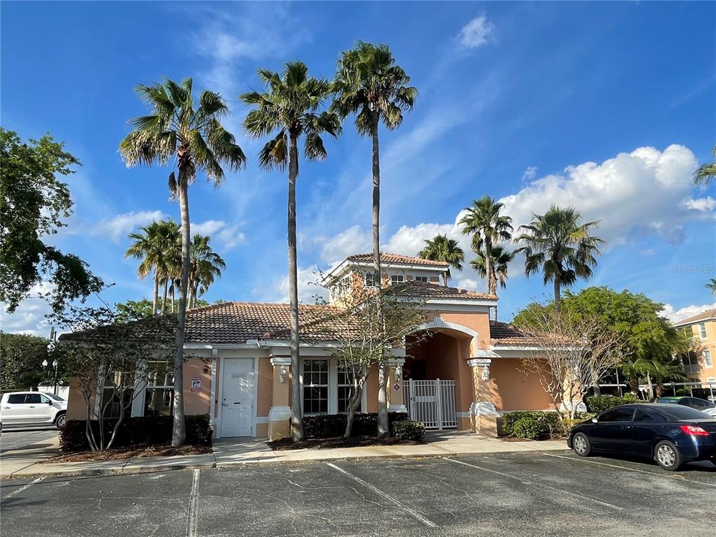 13548 Turtle Marsh Loop, Unit 427 Orlando, FL 32837 - Photo 34 of 34 a front view of a building with garden