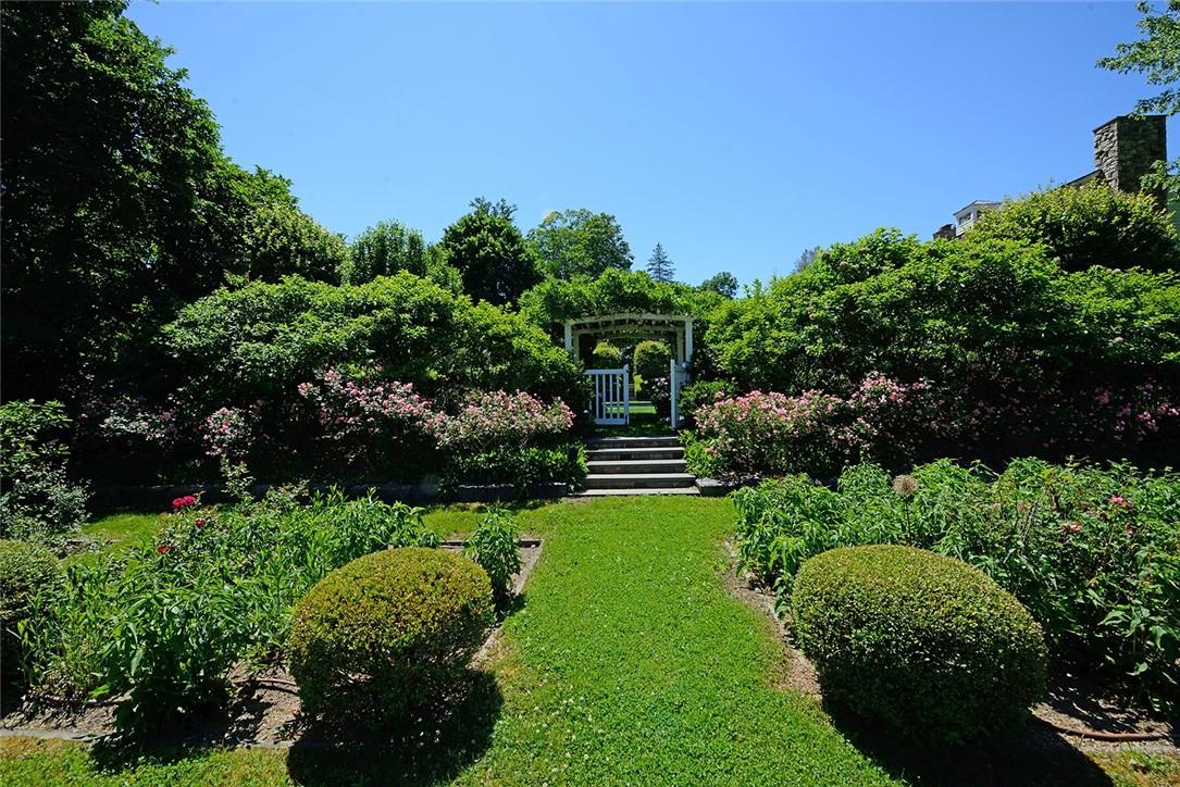 2007 A/b Purchase Street Harrison, NY 10577 - Photo 42 of 50 a view of a garden with a building in the background