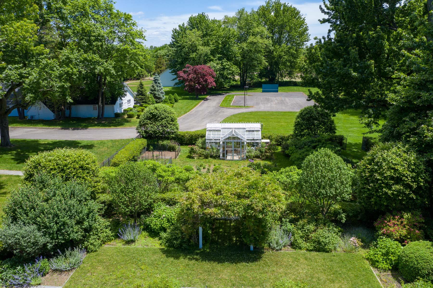 2007 A/b Purchase Street Harrison, NY 10577 - Photo 43 of 50 a view of a swimming pool with a garden