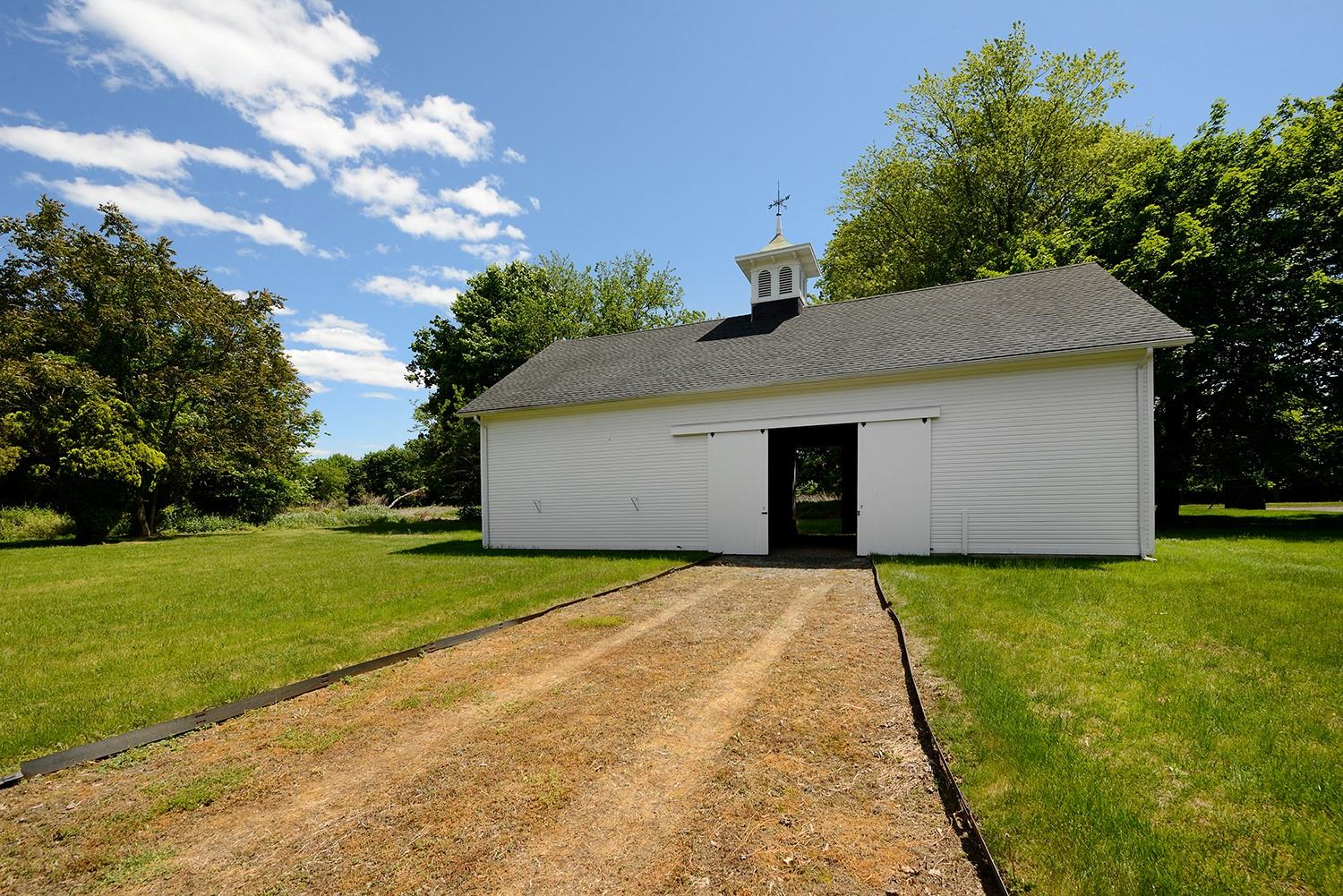 2007 A/b Purchase Street Harrison, NY 10577 - Photo 46 of 50 a front view of a house with garden
