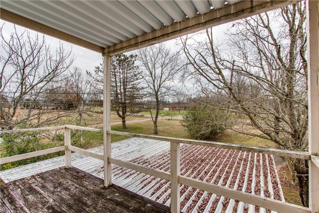 6085 Alvin Sperry Road Mount Juliet, TN 37122 - Photo 17 of 20 front porch of apartment over shop