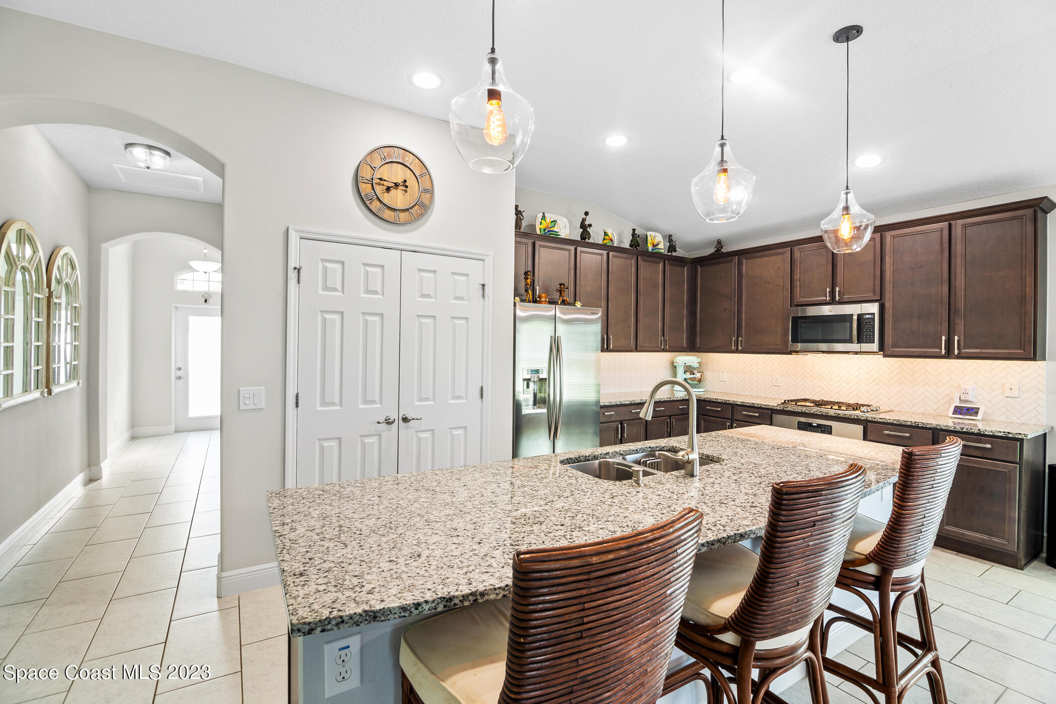 4475 Ruthann Circle Melbourne, FL 32934 - Photo 7 of 45 Hallway To Kitchen