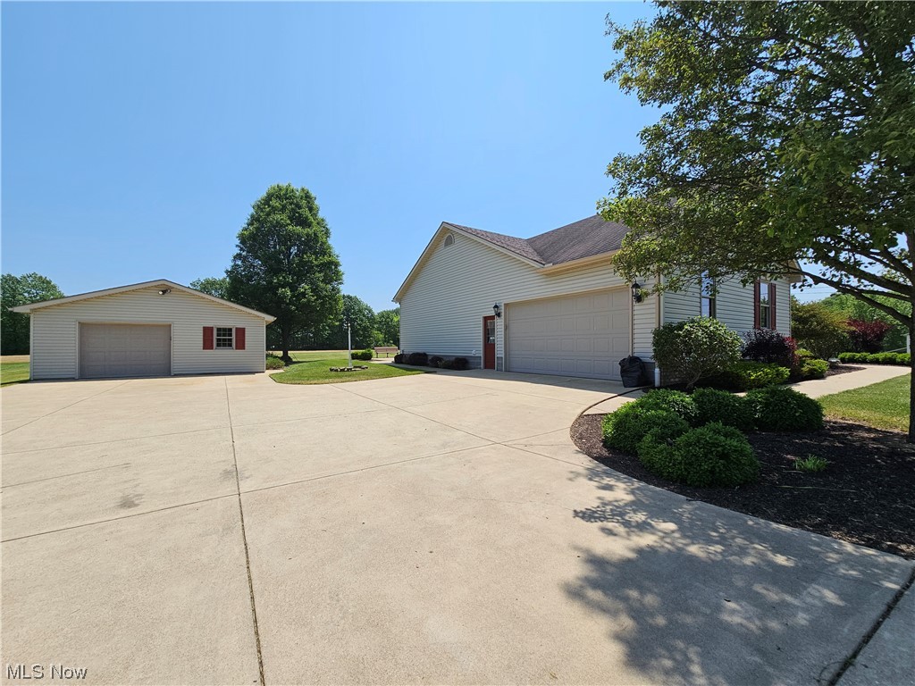 5120 Pierce Road Northwest Warren, OH 44481 - Photo 5 of 35 View of frontwith attached and detached garages