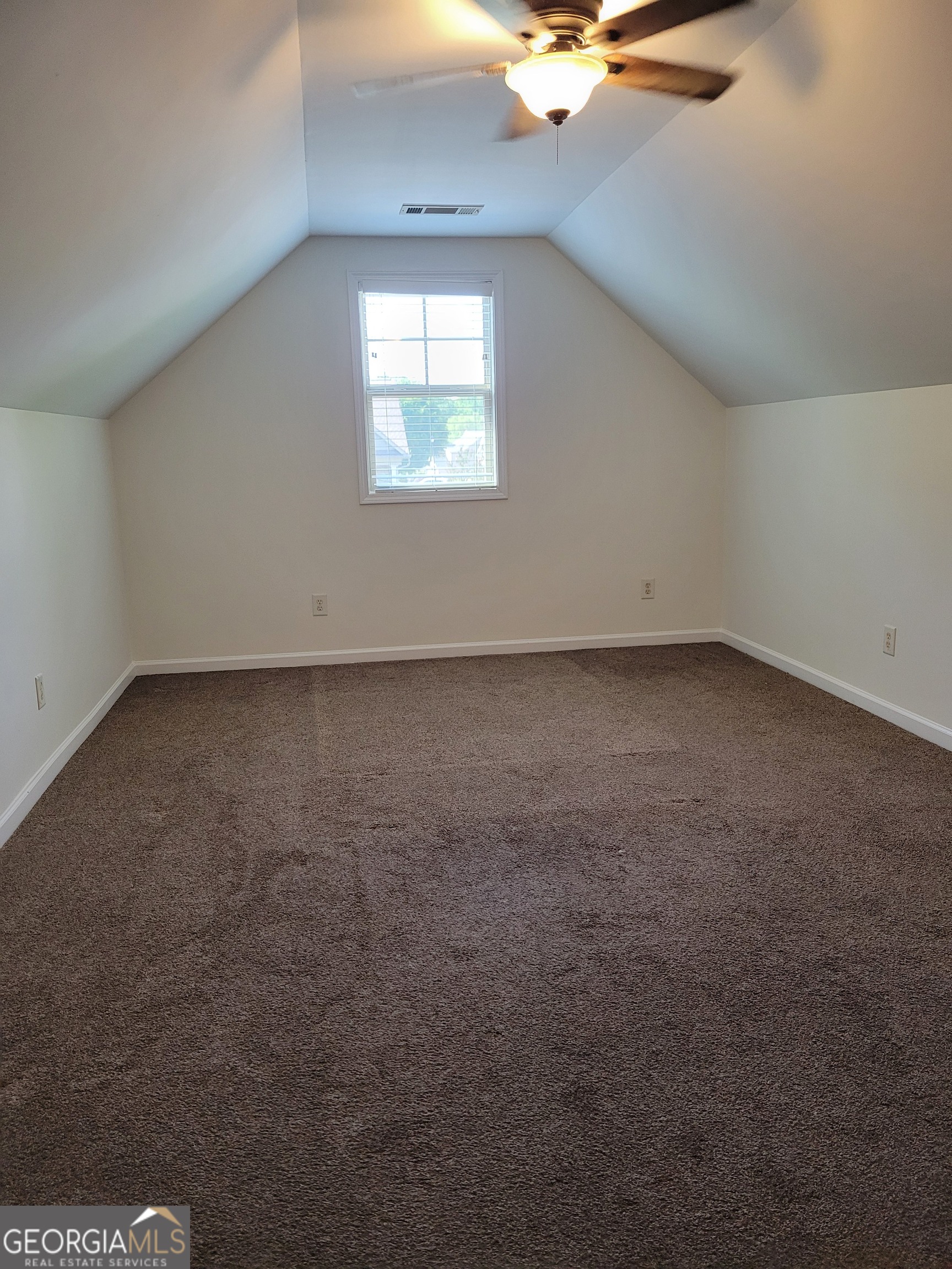 175 Spinner Drive Jefferson, GA 30549 - Photo 19 of 34 an empty room with a window