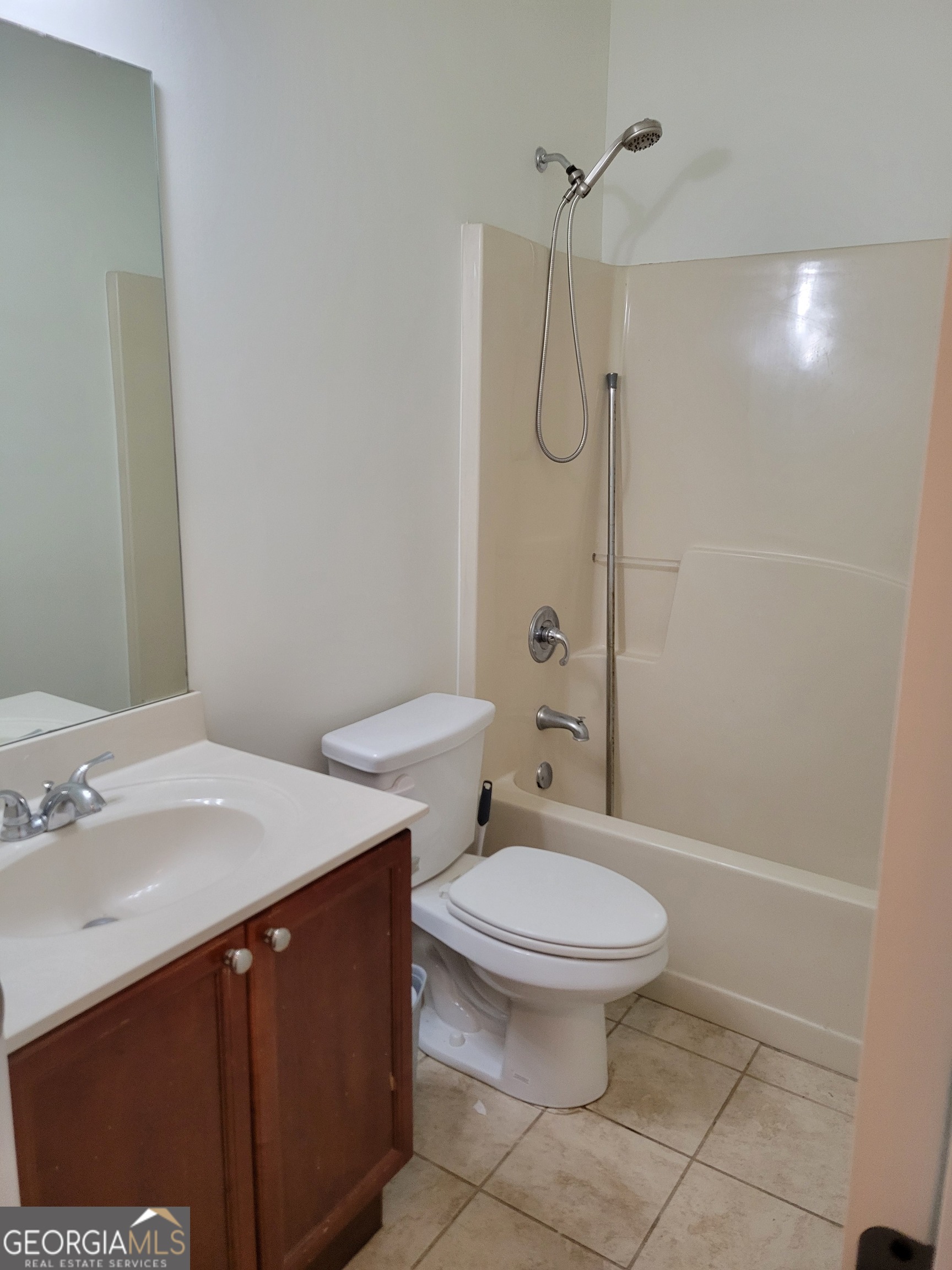 175 Spinner Drive Jefferson, GA 30549 - Photo 23 of 34 a bathroom with a sink a toilet and shower